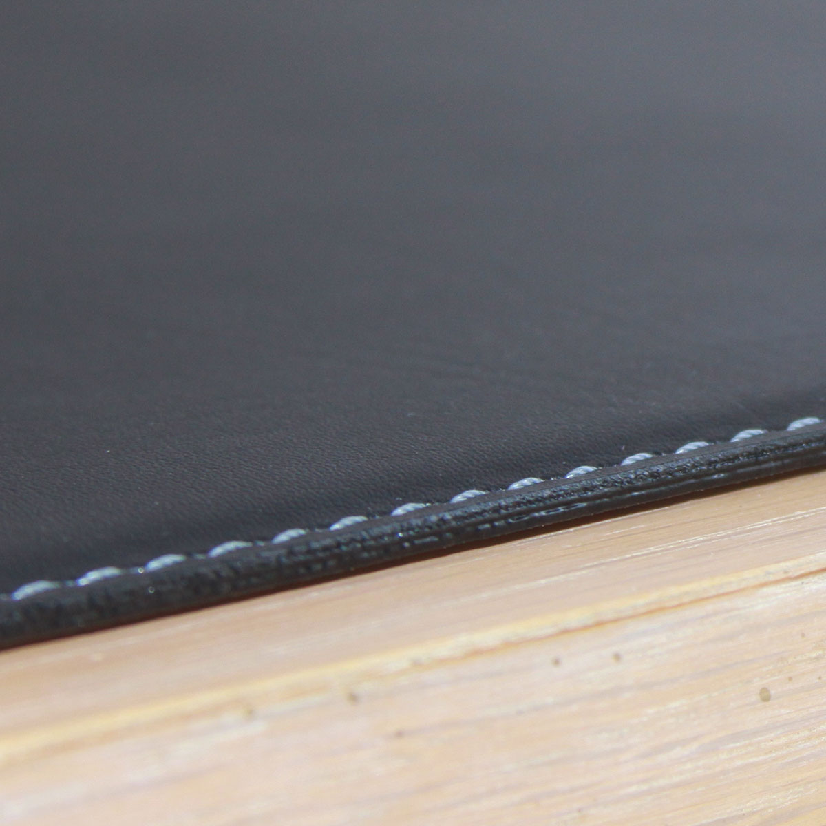 Black 17" x 12" Leatherette Square Corner Placemat w/ White Stitching