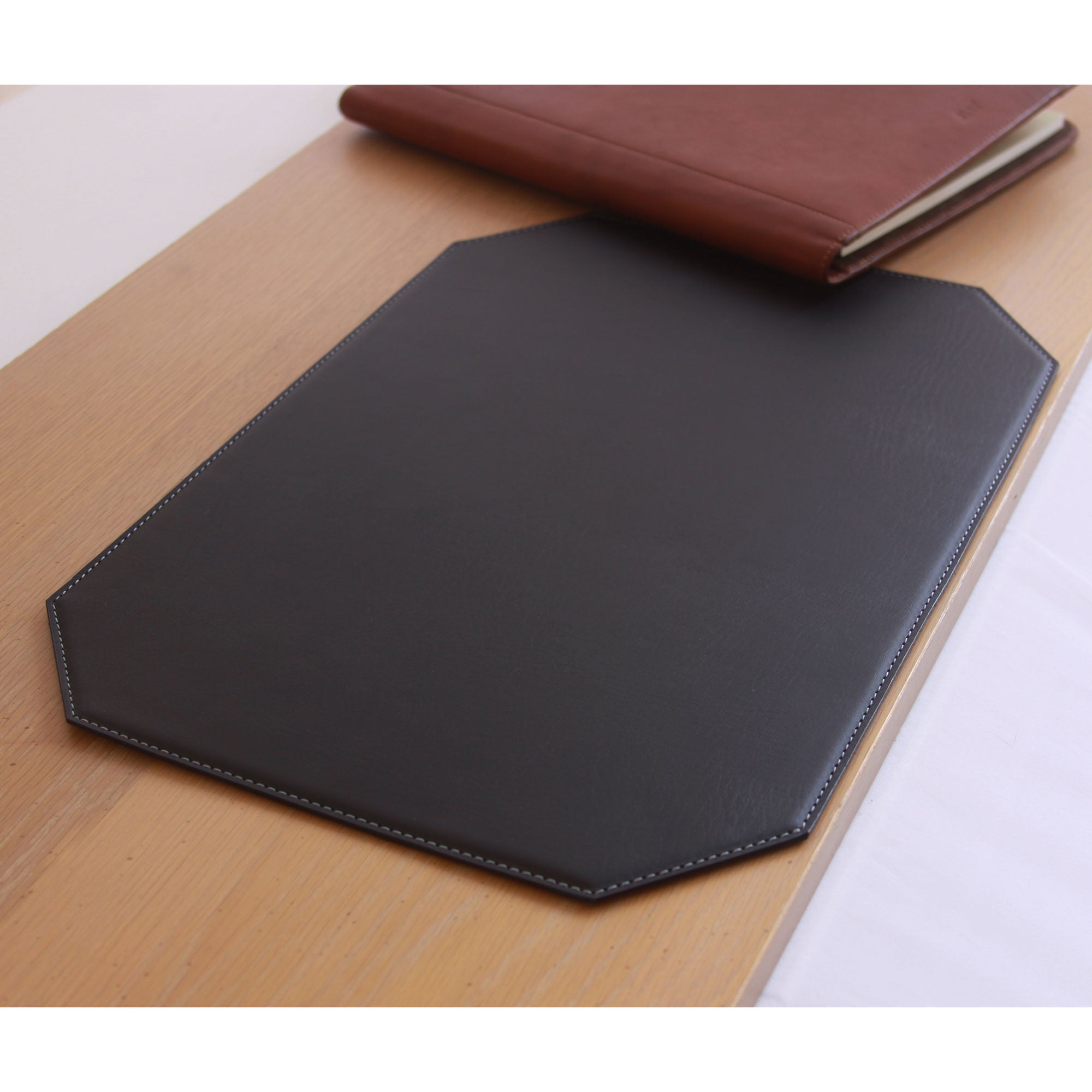 Black 17" x 12" Leatherette Cut Corner Placemat w/ White Stitching