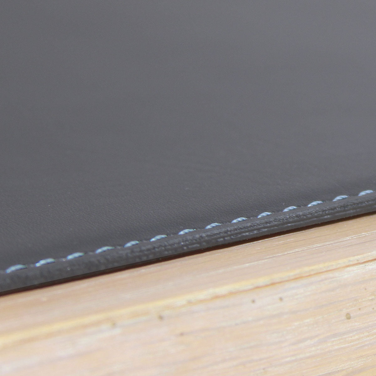 Gray 17" x 12" Leatherette Square Corner Placemat w/ White Stitching